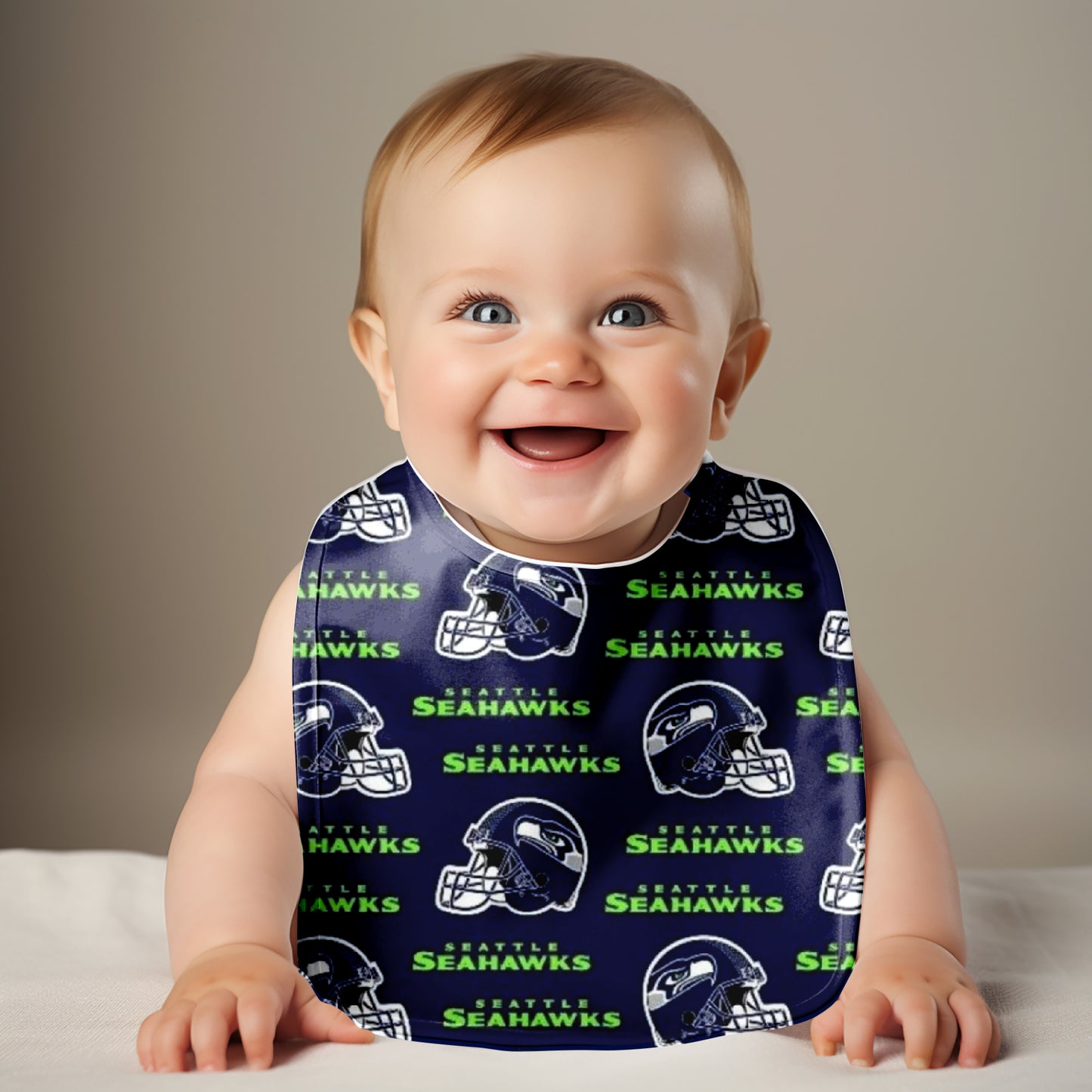 Smiling Baby wearing Seattle Seahawks Bib