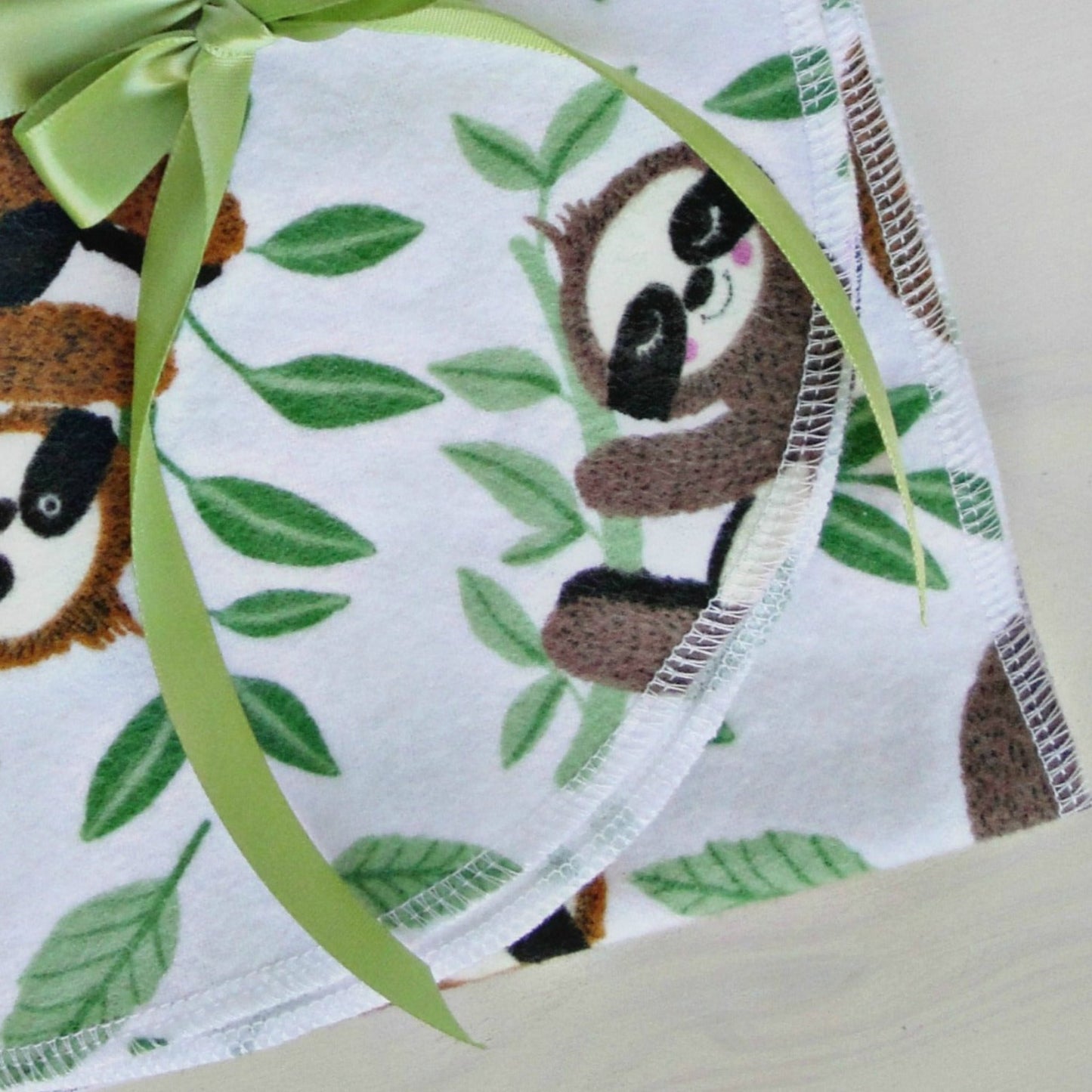 Sleepy Baby Sloths Flannel Blanket Up Close