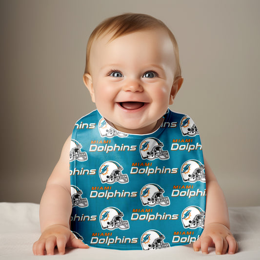 Smiling baby wearing Miami Dolphins bib