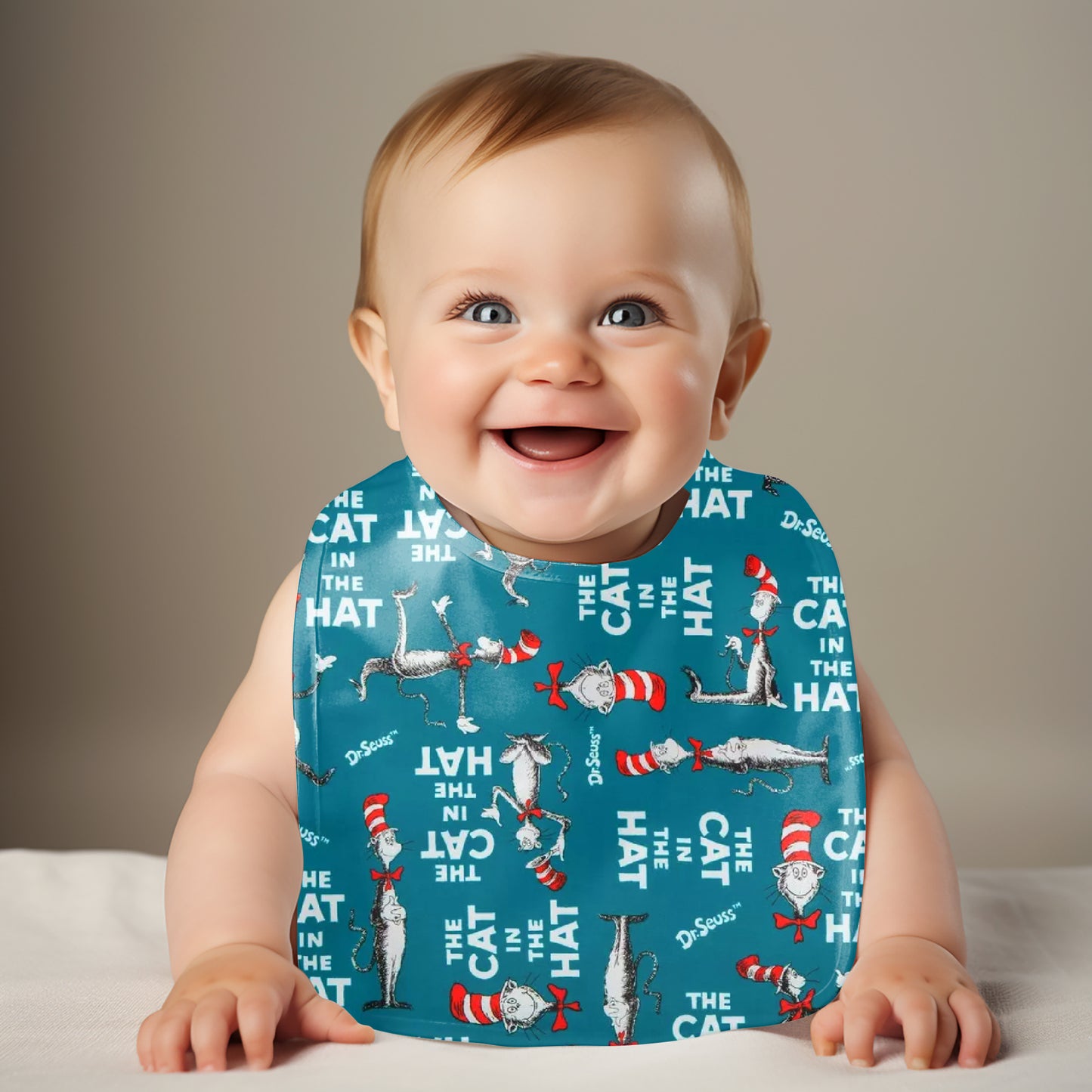 Smiling Baby wearing cat in the hat bib