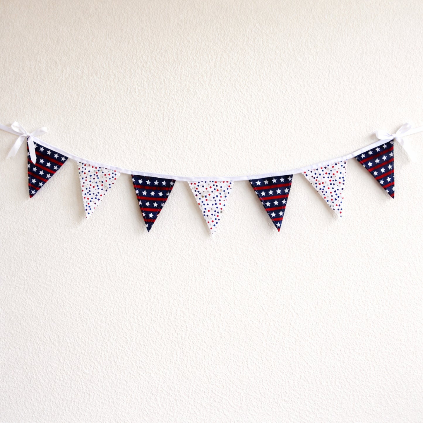 Handmade patriotic bunting banner with seven fabric flags red white and blue stars wall decor for Fourth of July