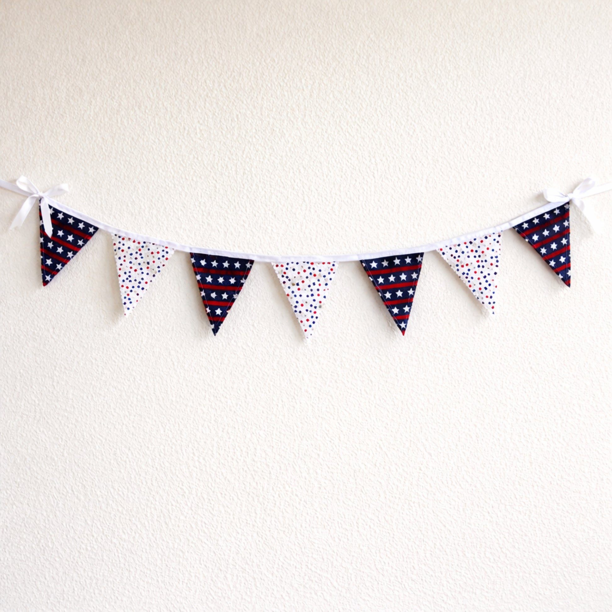 Handmade patriotic bunting banner with seven fabric flags red white and blue stars wall decor for Fourth of July