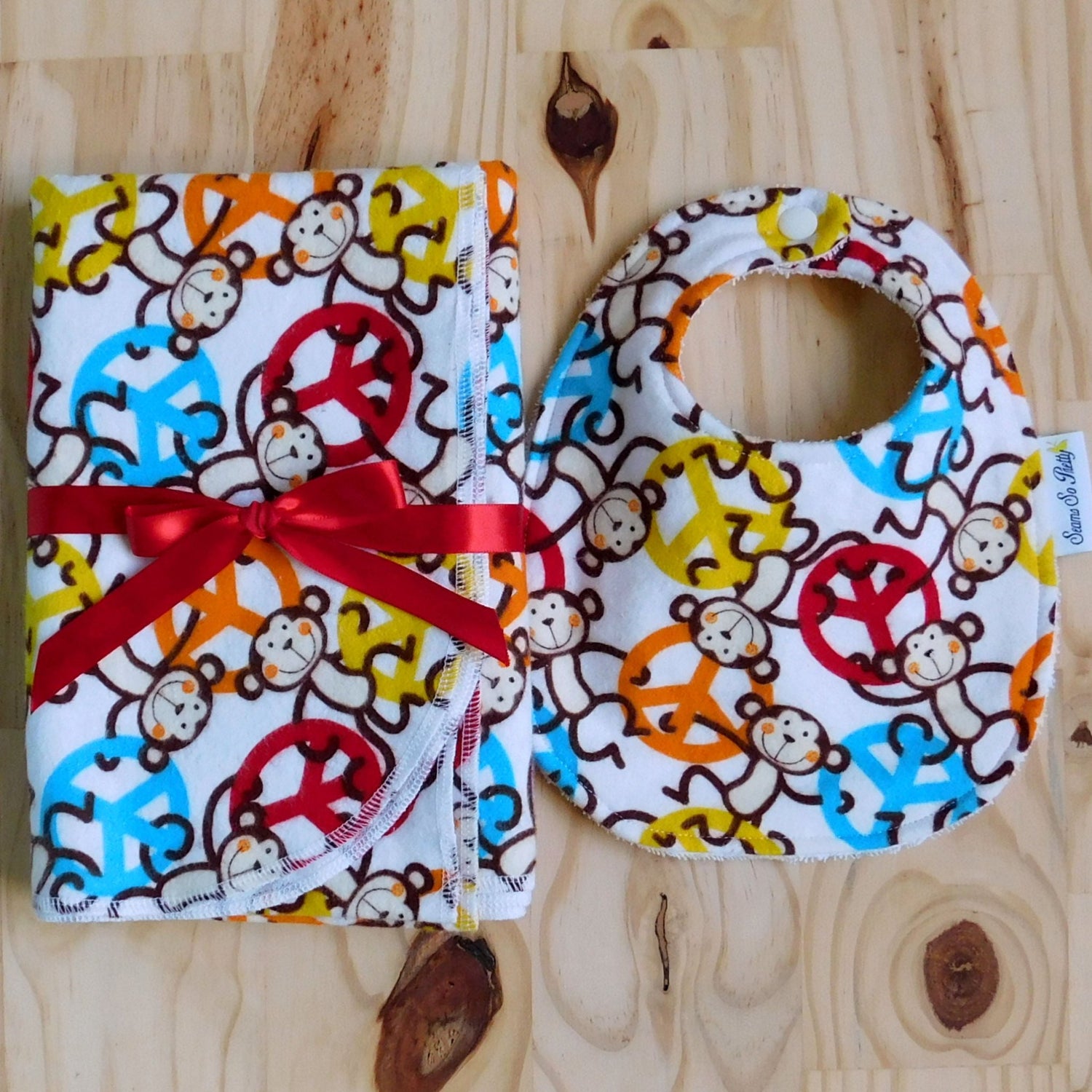 Colorful monkey print newborn bib and receiving blanket gift set