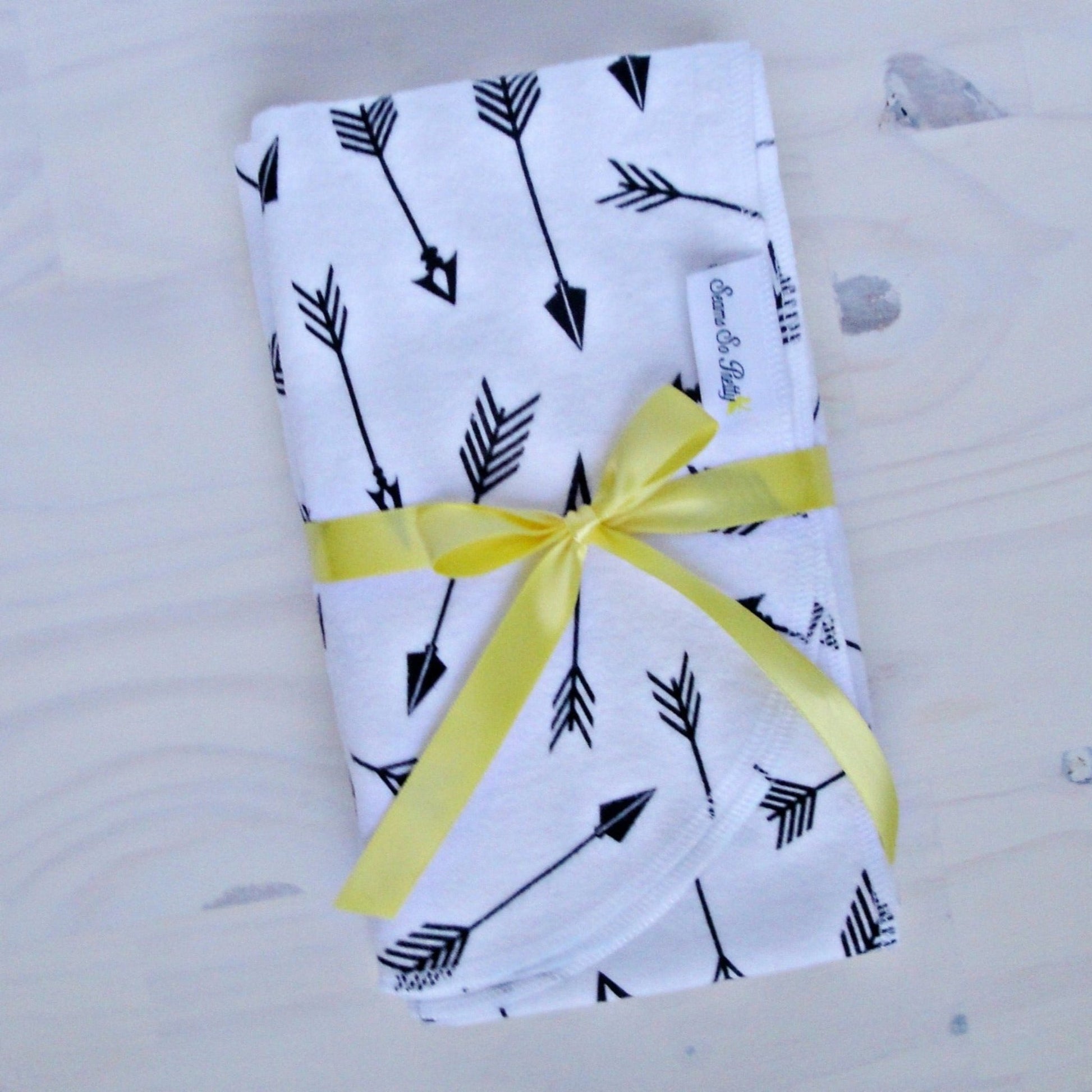 arrows receiving blanket packaged with ribbon