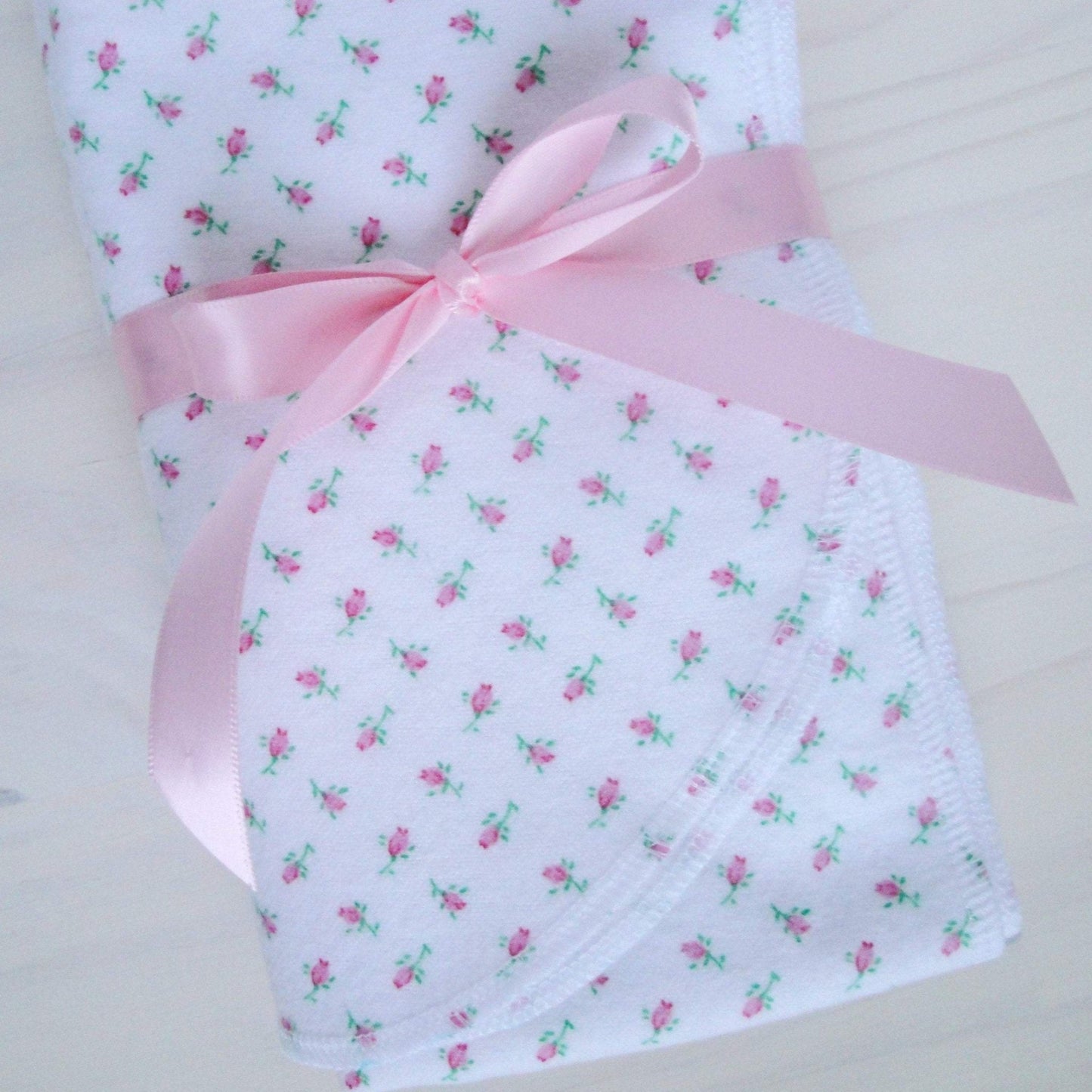 Tiny Pink Rosebuds Flannel Receiving Blanket Close up