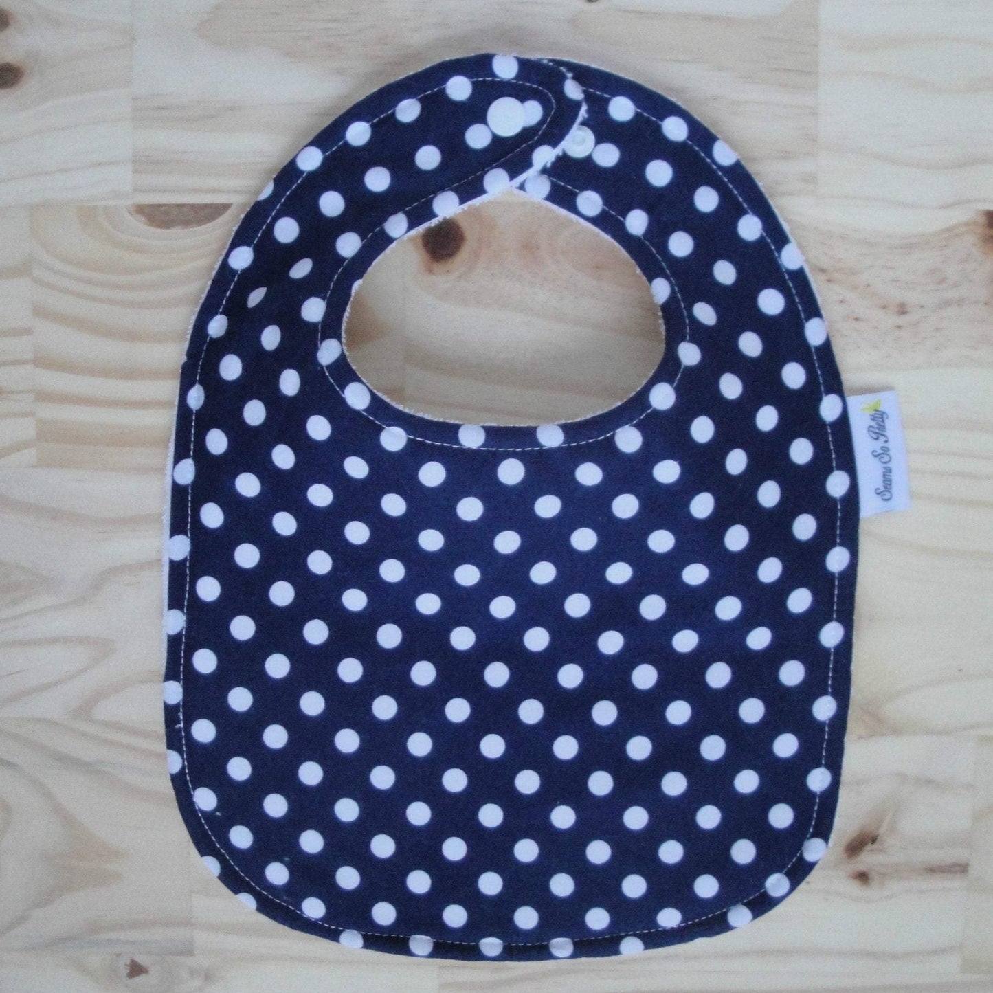 Navy and White Polka Dot Bib Front