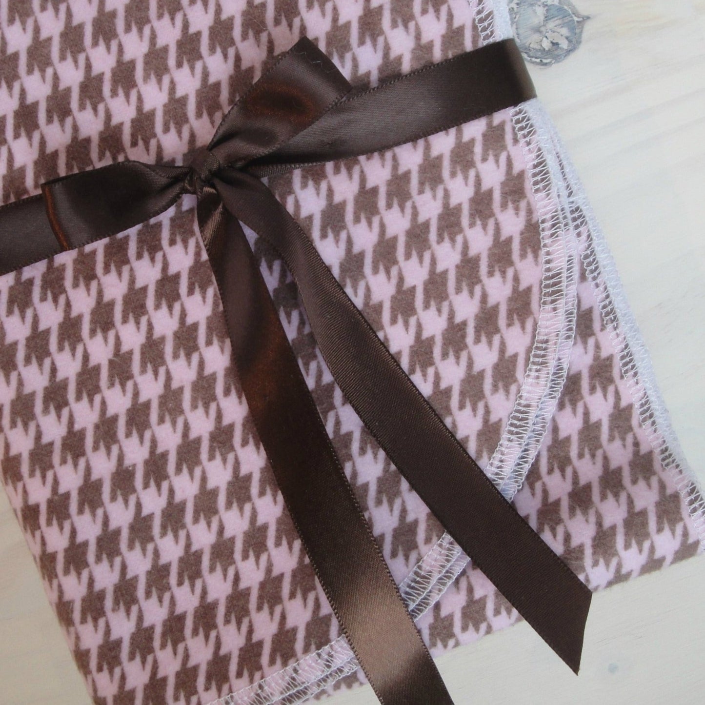 Pink and Brown Houndstooth Check Flannel Receiving Blanket Up Close
