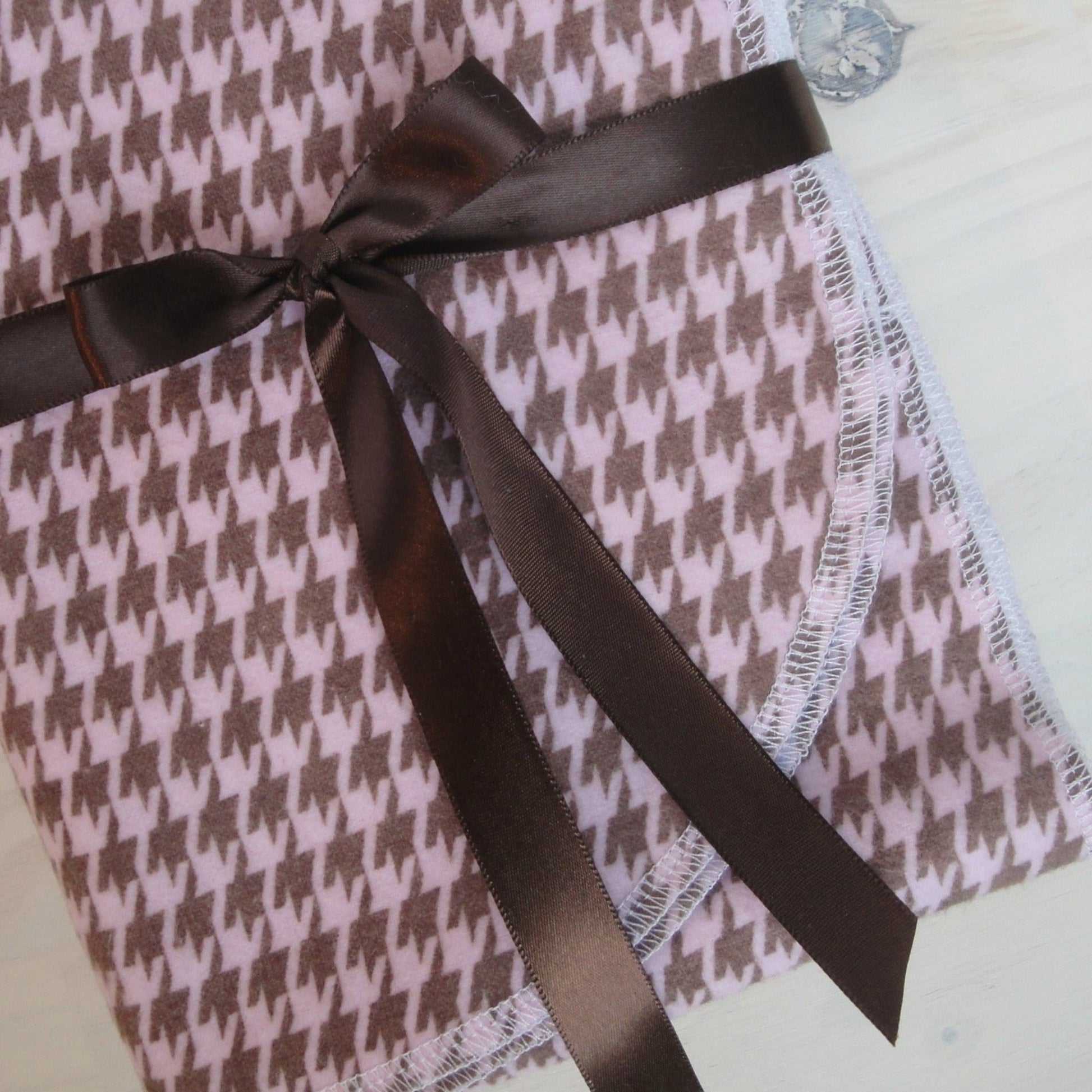 Pink and Brown Houndstooth Check Flannel Receiving Blanket Up Close