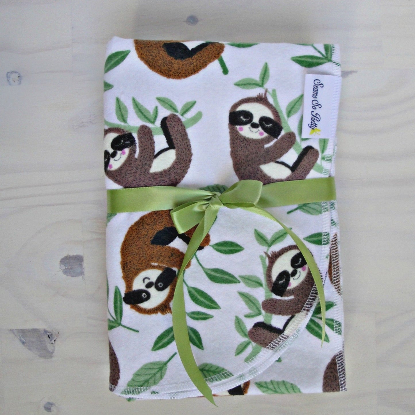 Sleepy Baby Sloths Flannel Blanket Packaged