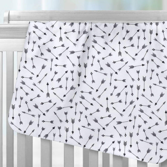 arrows receiving blanket hung over crib